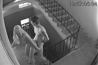 Lovers making love on the staircase - hidden camera