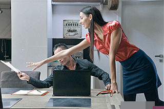 Businessman is romping with his secretary