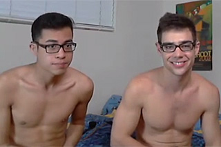 Student couple is playing in front of a webcam - gay porn