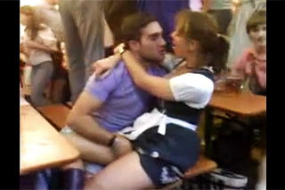 Oktoberfest participant flirting with a waitress (Short erotic video)